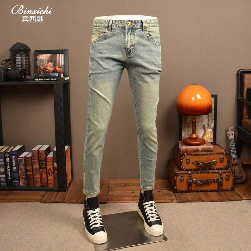 Retro denim pants that evoke a sense of nostalgia for men, stylish Korean streetwear, a soft and elastic slim fit, versatile cas