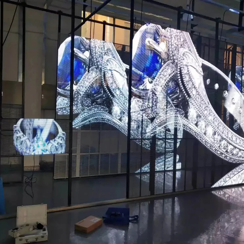 

Hot Seller:Wholesale Advertising Transparent LED Film Super Light Transparent LED Screen Outdoor Hanging LED Film