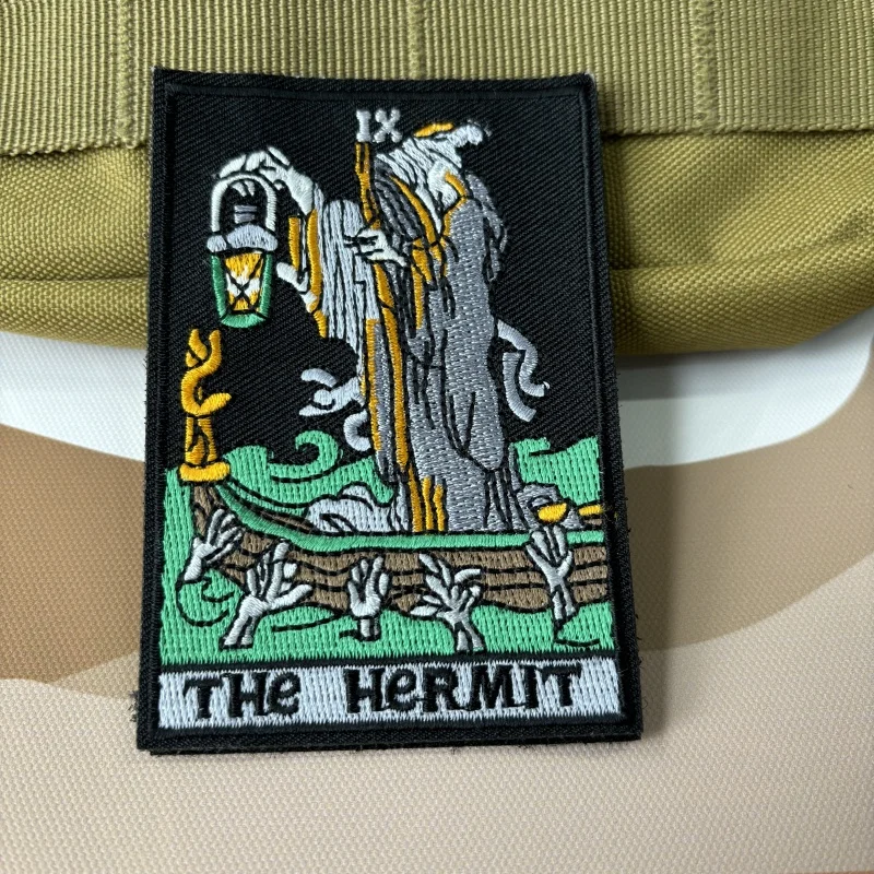 

The Hermit Ferry Man Purgatory Hell Morale Badge Hook&Loop Embroidered Death Patches on Clothes Tactical Backpack Stickers