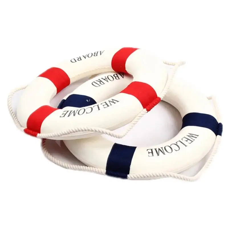 Nautical life buoy hanging on a white wall