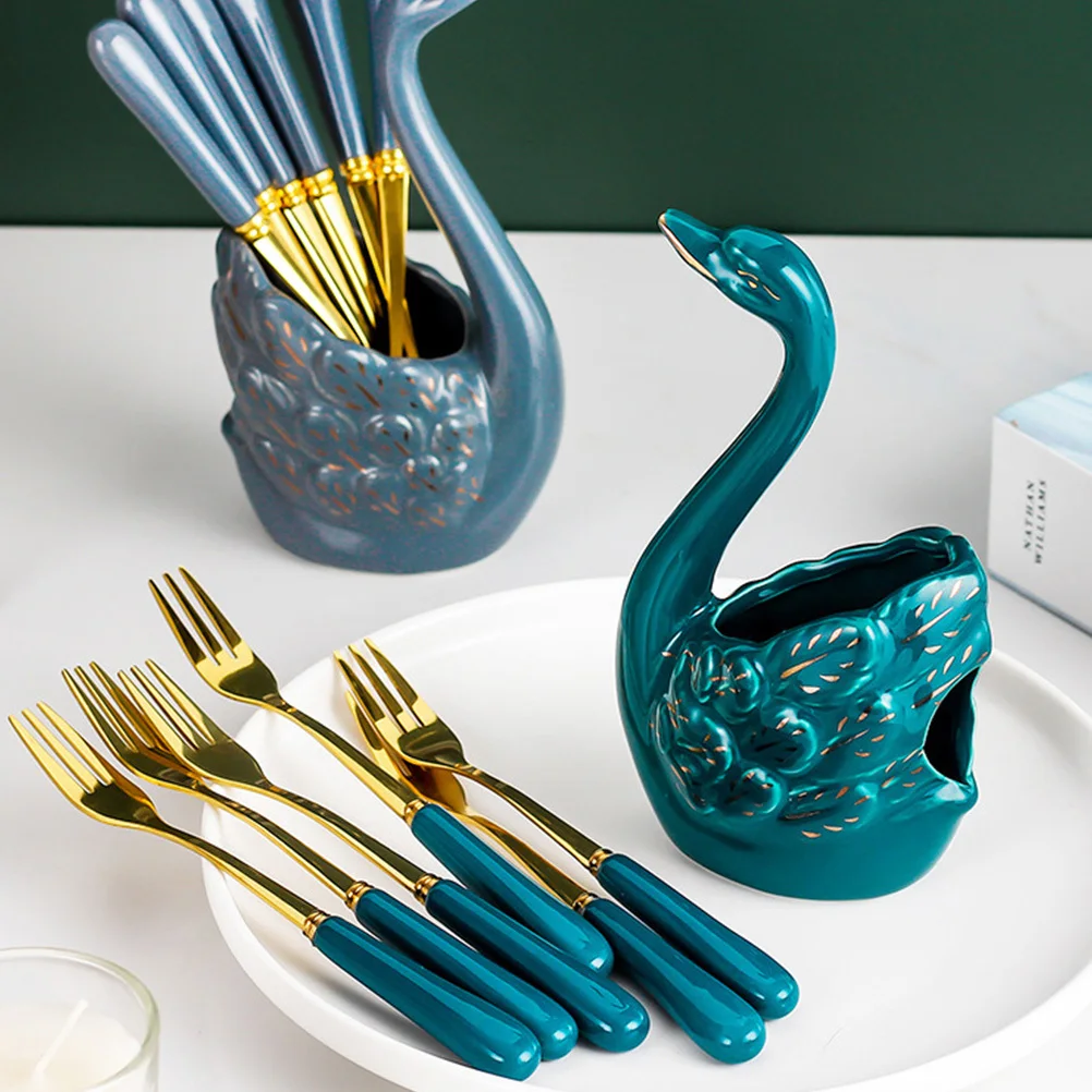 مجموعة واحدة من شوك الفاكهة المصنوعة من الفولاذ المقاوم للصدأ وحاوية تخزين سيراميك أنيقة على شكل بجعة للمقهى المنزلي