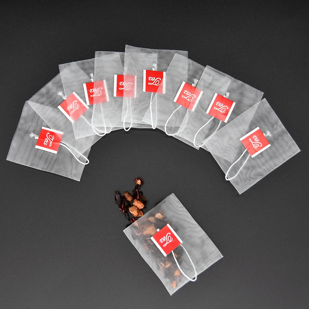 65 X 80mm 10000pcs Nylon Pyramid Shape Heat Seal Tea Bags With Tag Transparent Disposable