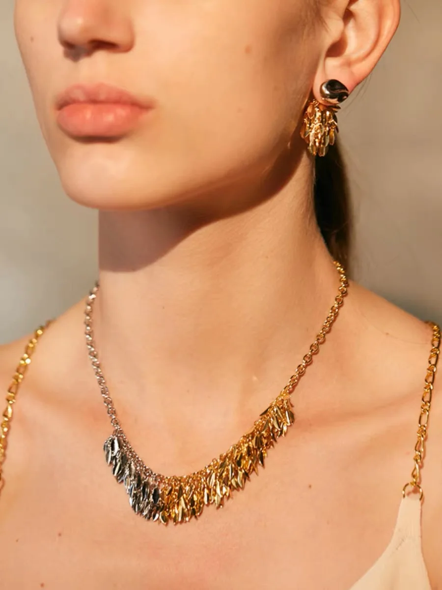 

Small niche design, tassel, leaf, feminine temperament, high-end feel, gold and silver contrasting necklace