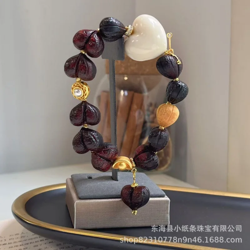 

Rosewood - multi- single-loop paired with ivory heart-shaped bead bracelet