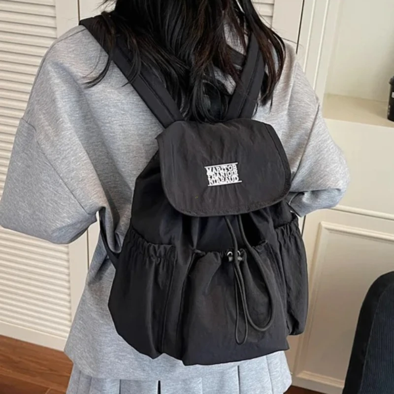 

Casual Large Capaci Student Backpack Women's 2026 New Sle Outdoor Faion Commuting Bag Lightweight Simple Design Multifu Backpack