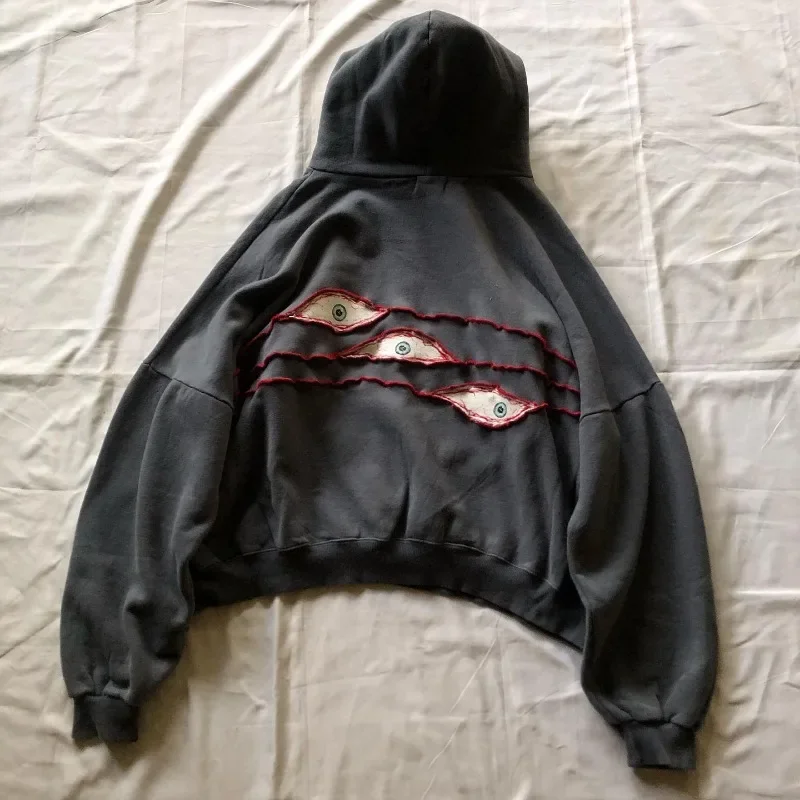 Sudadera con capucha Y2K Harajuku para hombre y mujer, ropa de calle vintage con bordado de Ojos de demonio, Hip Hop, jersey de moda americana de