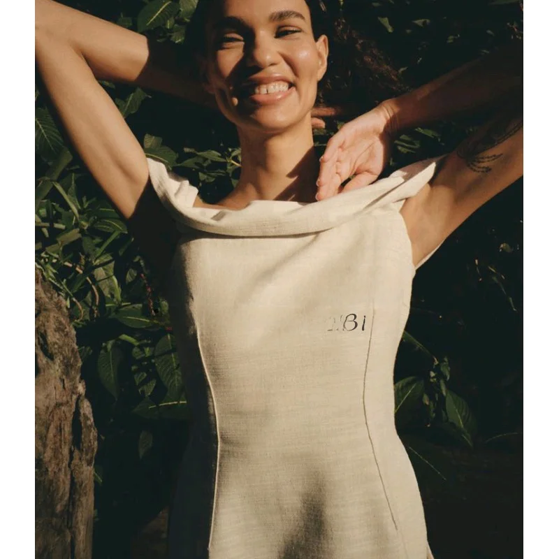 Lente nieuwe veelzijdige rechte kraag zijsplit oulder ontbloot top hoge taille wijde pijpen broek faionable damesset