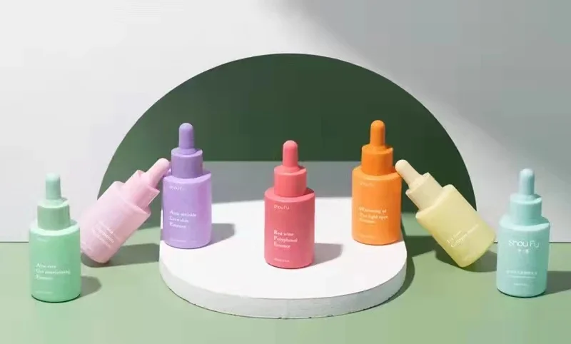 

Luxury flat shoulder macaron color matte pink blue green yellow glass serum dropper bottle Argan oil bottles with dropper lids