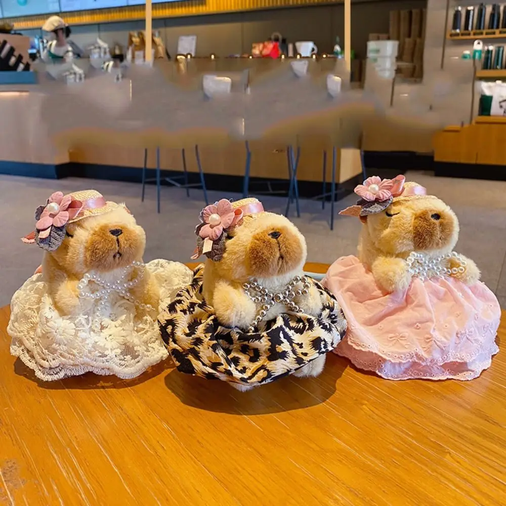 Muñecas de peluche de capibara de algodón PP, falda con estampado de leopardo, muñeco de peluche, llavero con colgante Kapibala, colección de animales de dibujos animados