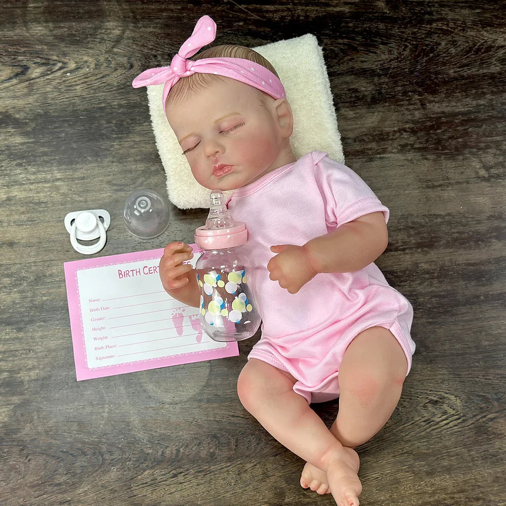 Muñeca Reborn de vinilo de 22 pulgadas |   Pelo pintado a mano, cara de porciones |   Textura realista |   Lavable y Sittable |   Conjunto de traje rosa |