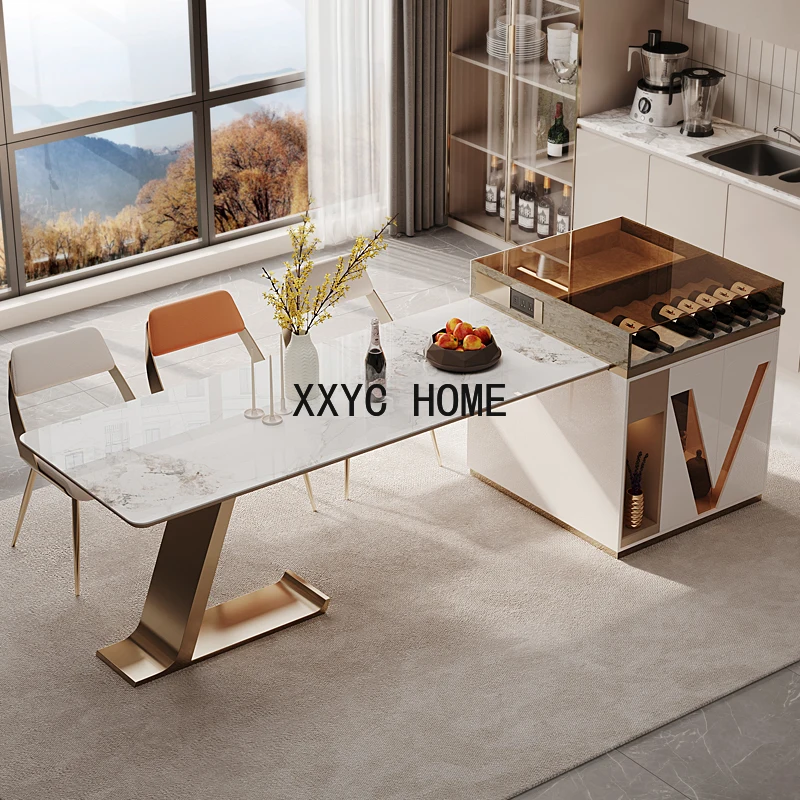 

Italian light luxury middle island table one simple light rock slab extension shrink apartment high-end dining table