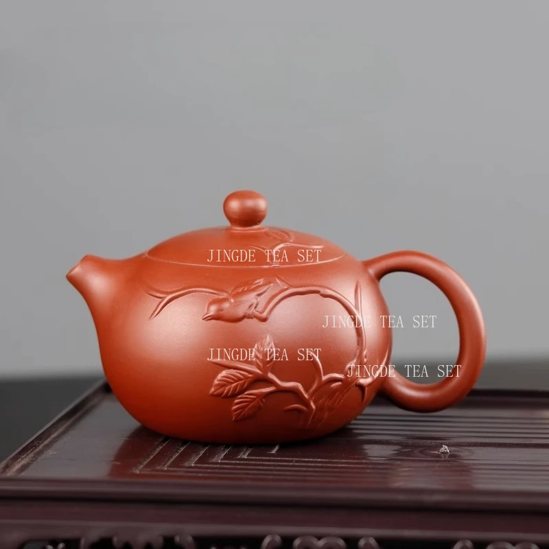 

Yixing Keti Zisha teapot original ore Zhuni rotatable Fengming teapot handmade Kung Fu relief Xishi teapot