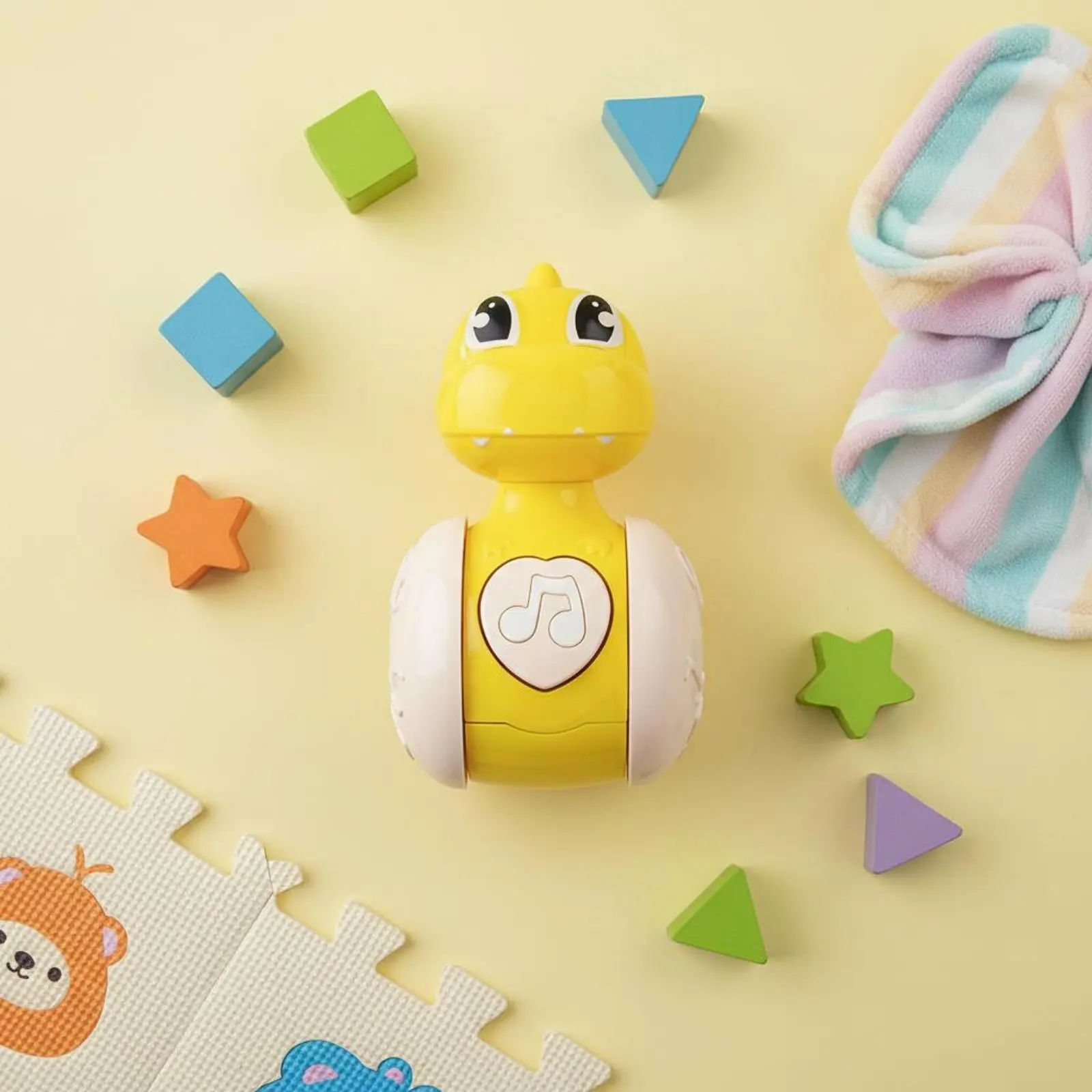 

Музыкальная игрушка-неваляшка в виде динозавра для младенцев, с гладкими краями, легко удерживать, легко толкать и передвигаться