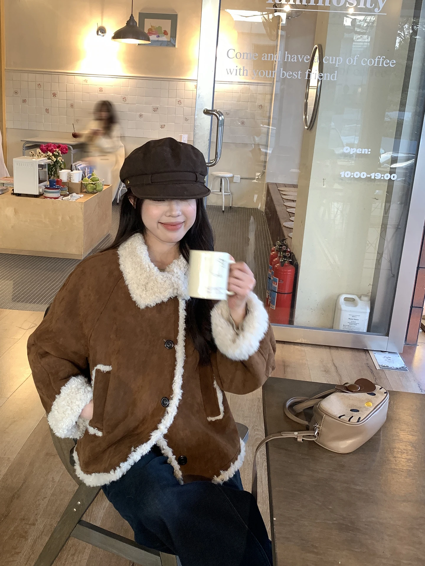 Cappotto in pelle scamosciata retrò da donna invernale pigro di fascia alta Aosphere Personali abbinato in pelliccia di pelle intermedia parte superiore del corpo colore caffè