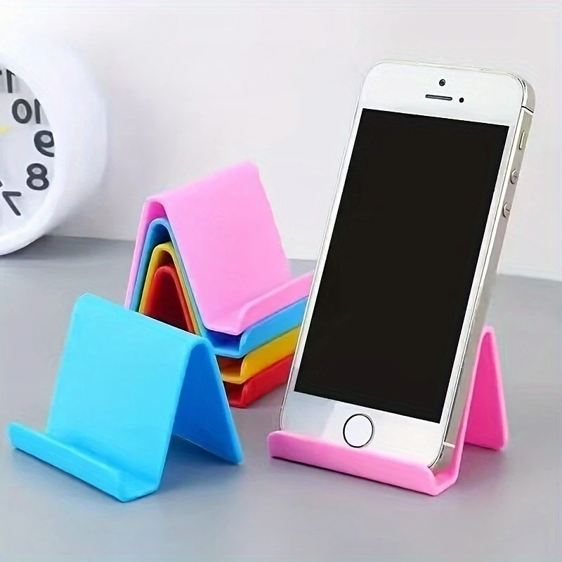

6pcs st6 color random solid color phone holder, desktop phone holder, phone tablet holder, compatible with most phones and tablets, suitable for home office desk use, random color
