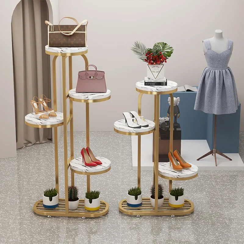 Shoe store floor-to-ceiling window display bag rack shoe rack golden iron clothing store display shelf flower