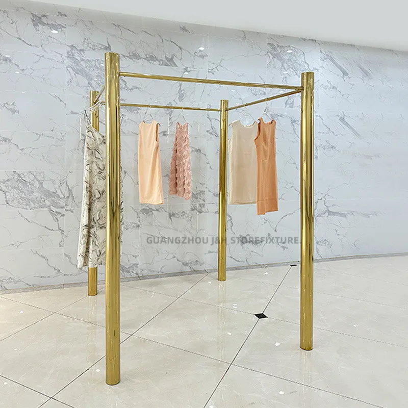 

customized.Fashion Shiny Metal Retail Clothing Display Stand Clothes Display Garment Boutique Clothes Rack with Shelf