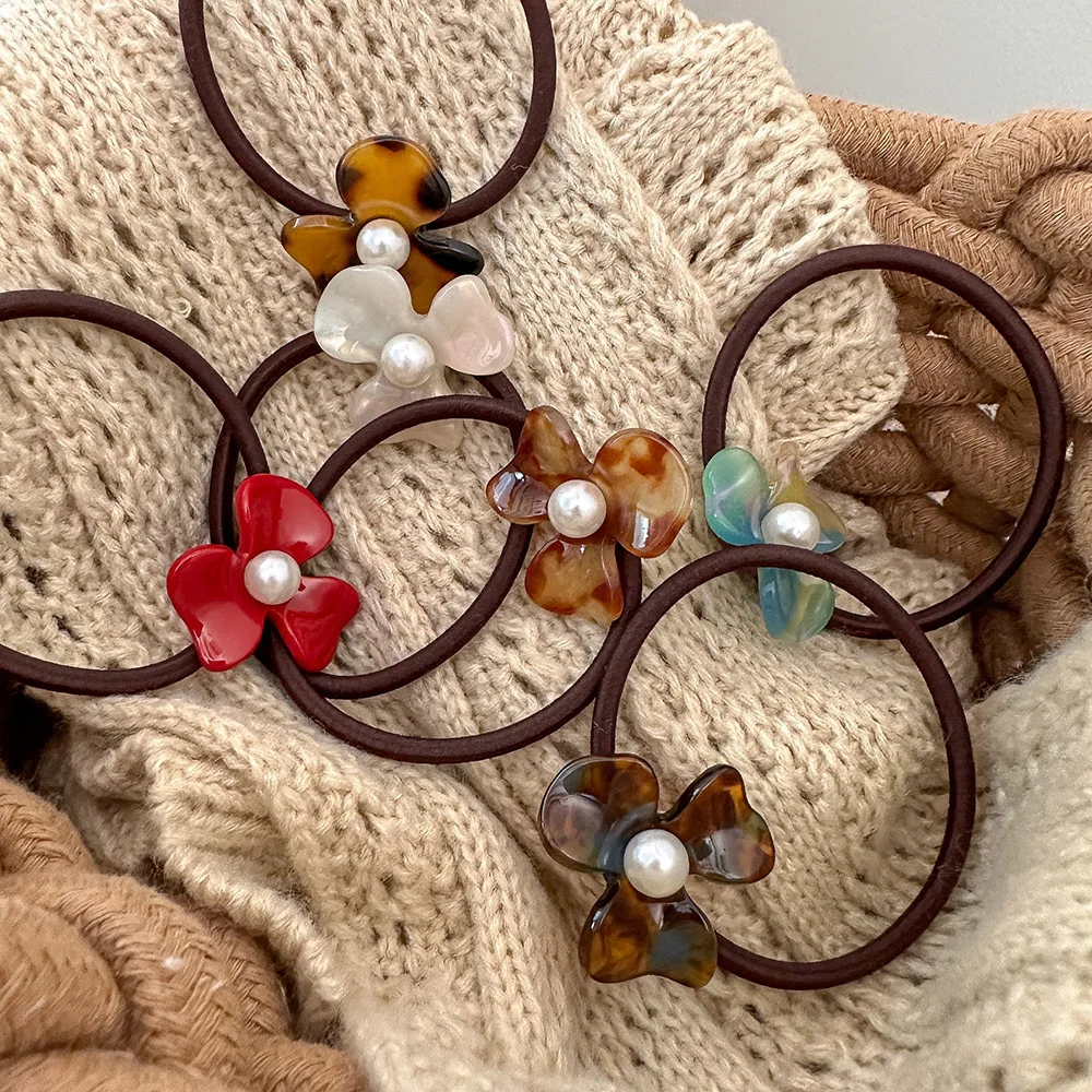 ربطة شعر أنيقة على شكل زهرة خلات ممتازة من أجل ذيل حصان منخفض عنابي