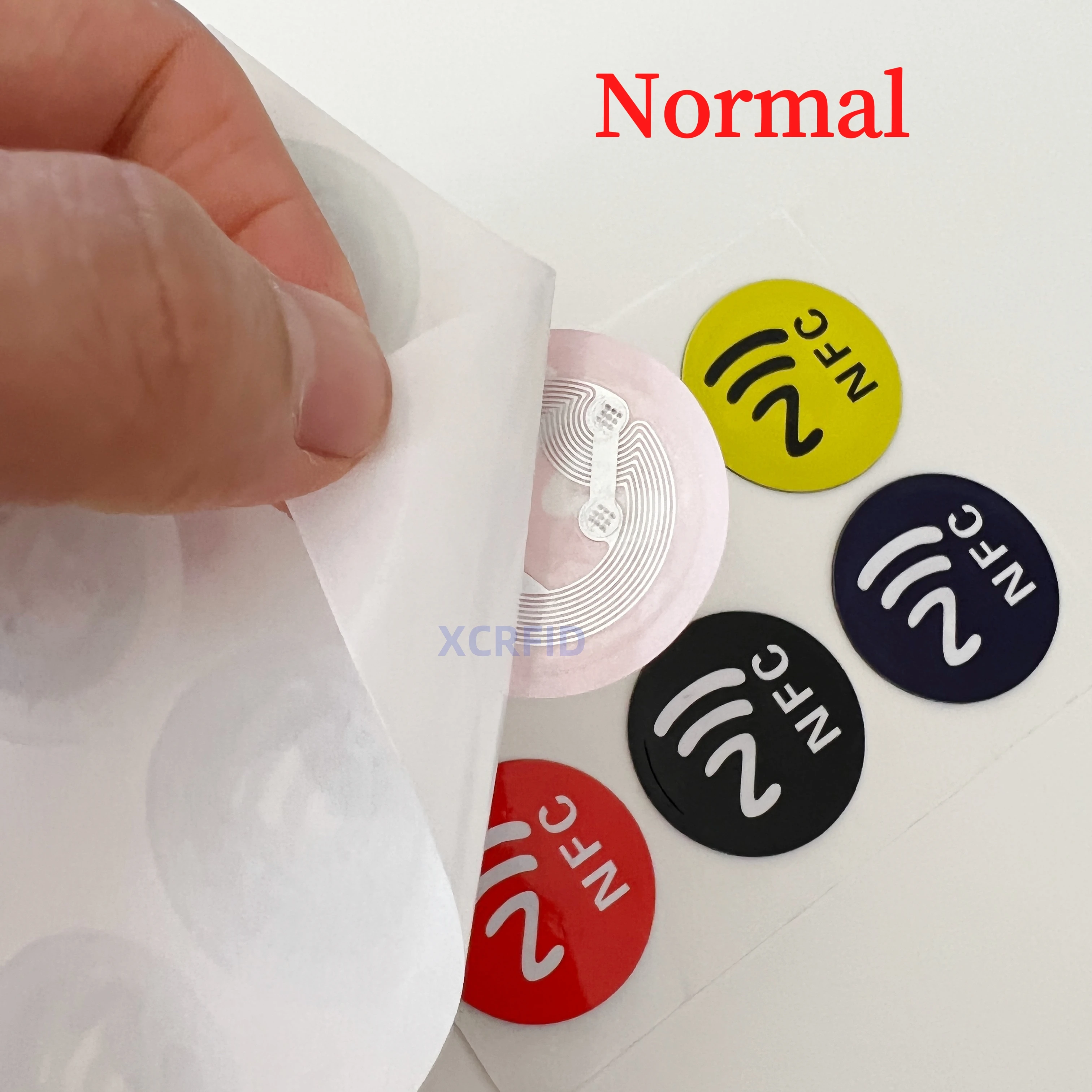 NFC NTAG215 RFID ป้ายแท็กกาว 504 ไบต์สําหรับโทรศัพท์มือถือ NFC ทั้งหมดและสําหรับ Amibo Tagmo