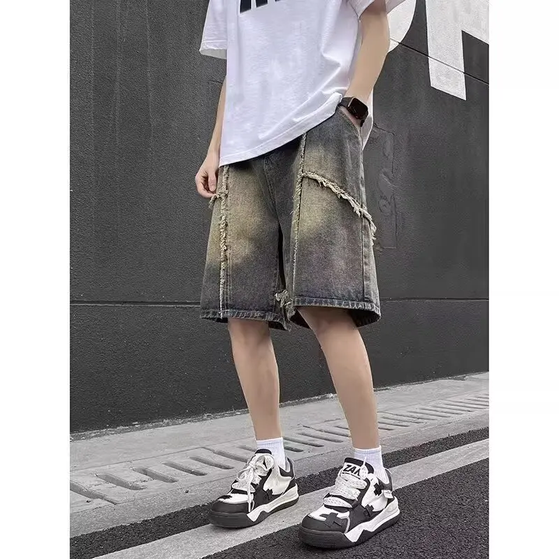 الأدبية الجديدة المتناثرة جوكر الاتجاه غير العلامة التجارية اليابانية الدنيم السراويل الذكور 2025 صيف جديد الأمريكية الرجعية.