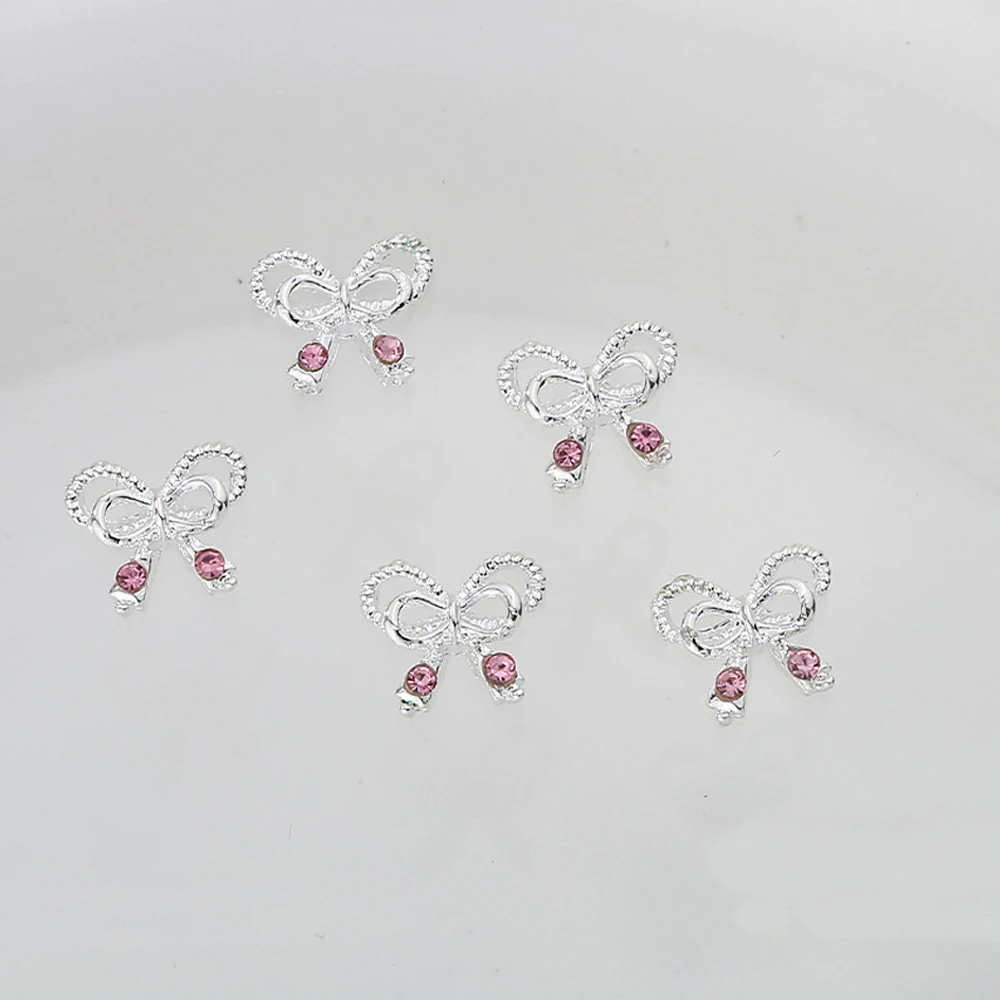 10pcs Pink Zircon Nail Art Charm 3D Hollow Butterfly Heart Ribbon with Pink Crystal Nail Decoration DIY Kawaii Nail Accessories