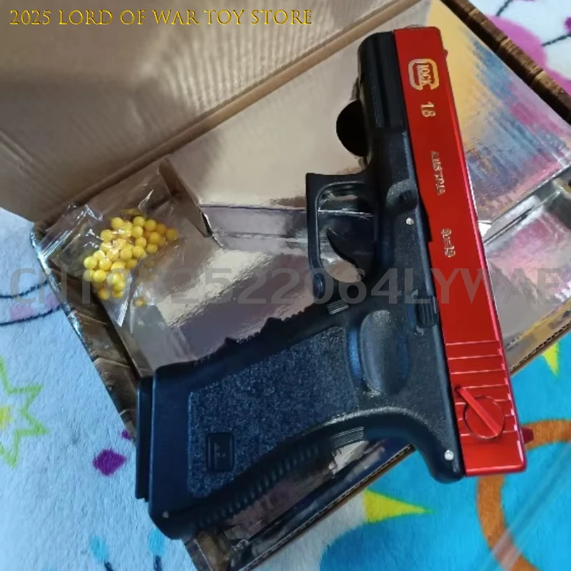 GELUOKE di alta qualità Camera vuota Appesa mitragliatrice Pistola giocattolo Pistola manuale a sgancio rapido Proiettile rotondo Rivista inferiore Regalo di Natale