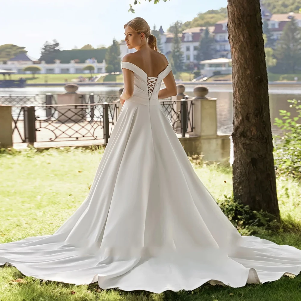 Exquisite A-Linie Brautkleider Ärmellos Elfenbein Spitze Brautkleider Gericht Zug Vestido De Novia Exquisite Neue Robe De Sommer