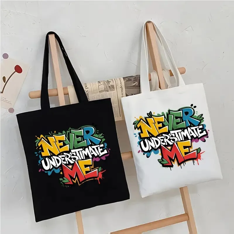 

Never Undestimate Me Canvas Tote Bag Cosmetic Bag Large Capacity Shopping Bags Shoulder Handbag Eco Girl Handbags