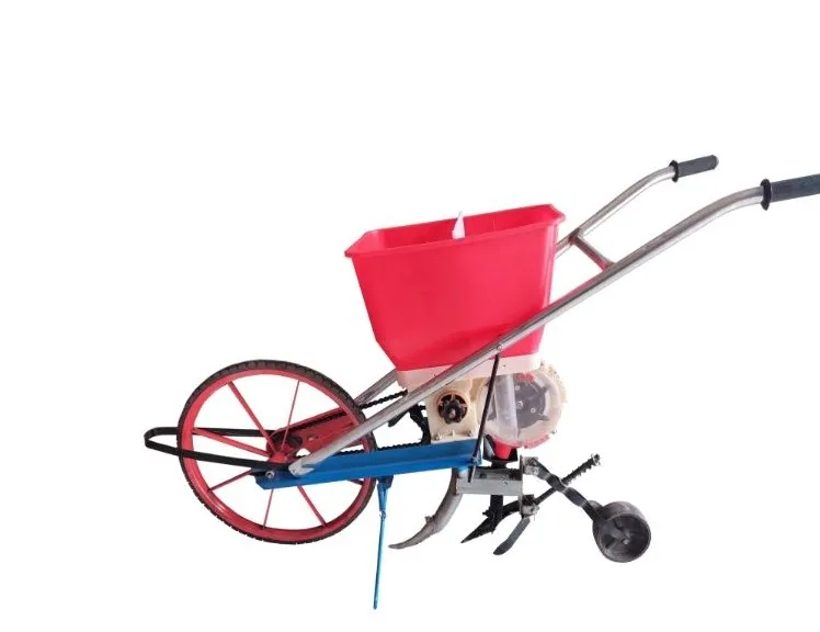 *Kleine agrarische bemesting artefact graan hand push-top dressing zaaimachine