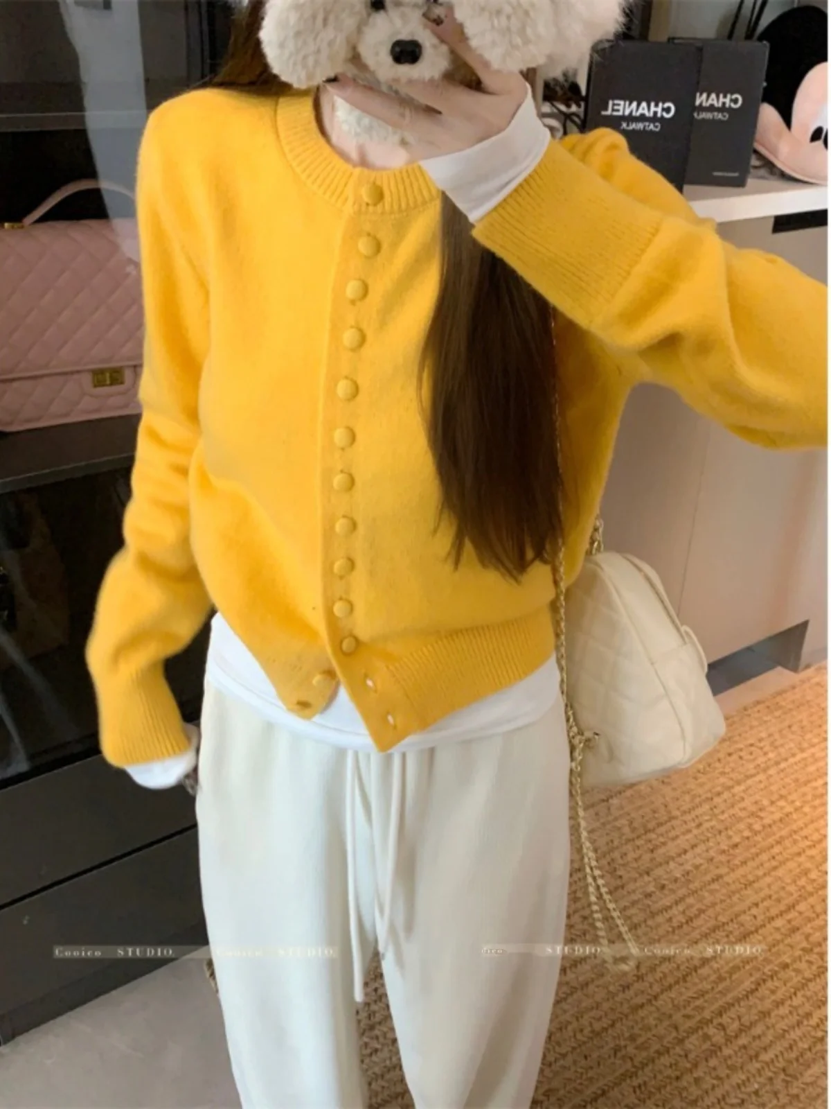 Styled as streetwear with cargo pants and sneakers