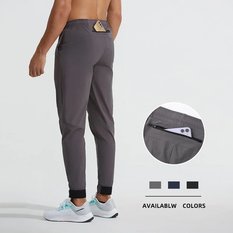 

Men Quick-drying Sport Pants with Zipper Pockets Gym Training Execise Running Joggings Sports Trousers Fitness Loose Sweatpants