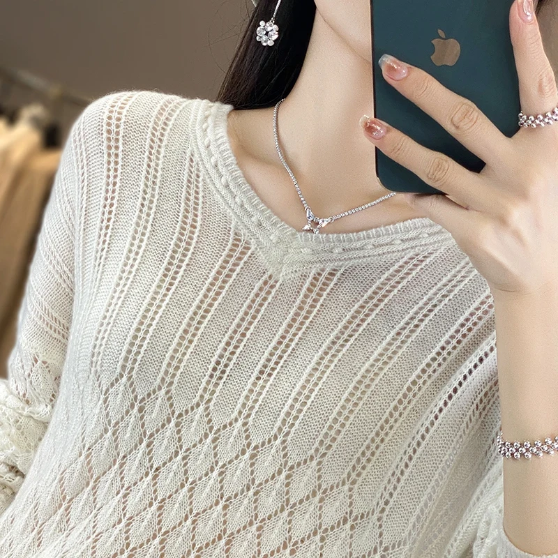 Autumn and winter new 100% pure wool female V-neck hollow sweater loose versatile temperament knitted cashmere bottoming shirt.