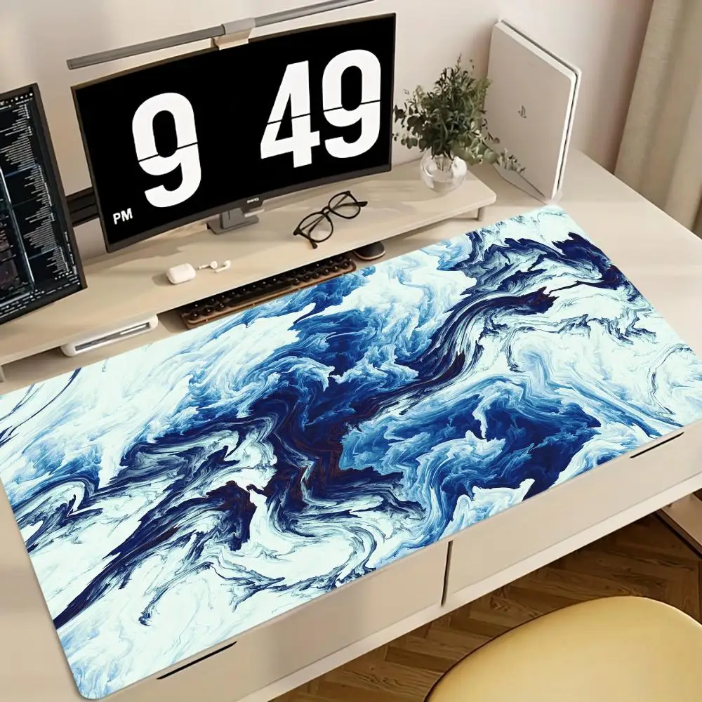 

Blue Marble Swirl mouse pad: Immerse Your Desk in the Fluid, Artistic Waves of Blue and White, Adding a Sophisticated