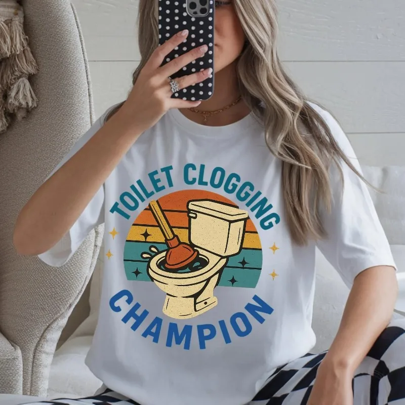 T-shirt humoristique « Champion des bouchons de toilettes » pour plombier – Cadeau rétro pour les amoureux de l'humour de la salle de bain – Idée cadeau rigolote pour hommes et femmes – T-shirt fantaisie