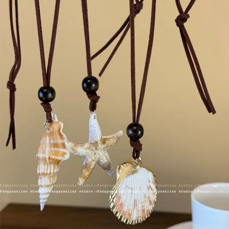 

Женское ожерелье в стиле морского отдыха, аксессуары для одежды, украшение на шею с морской раковиной, морской звездой и веревкой, богемное летнее украшение, подарок для женщин