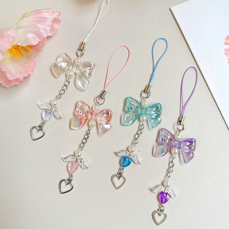 สายโซ่คล้องโทรศัพท์รูปโบว์ Y2k หวานปีกนางฟ้าน่ารักจี้รูปหัวใจเคสสายคล้องคอป้องกันการสูญหาย