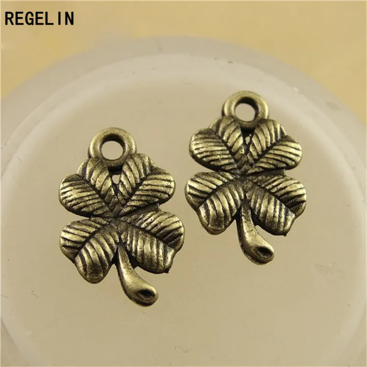 REGELIN 50pcs/lot LUCKY Four Leaf Clover jewelry Retro clover jewelry accessories wholesale 17x11mm jewelry findings