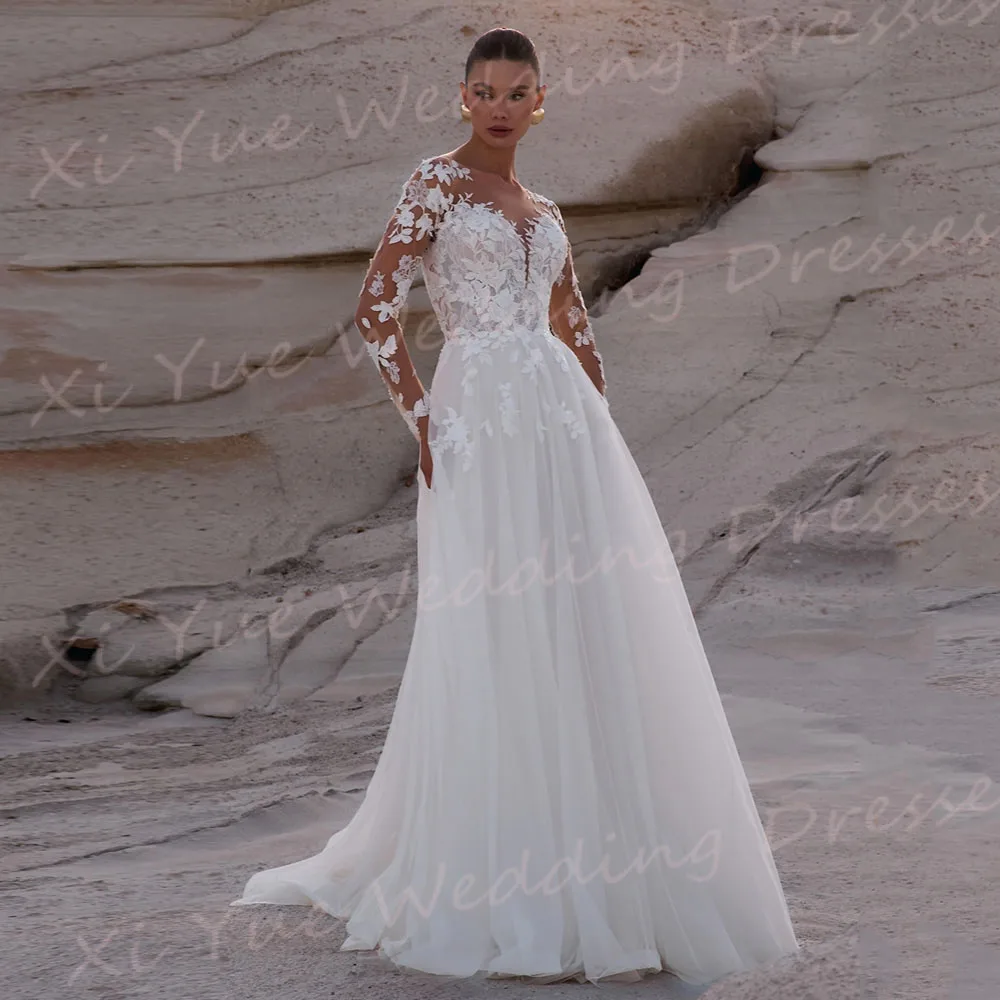 Boho Exquisite A Line abiti da sposa da donna Appliques classici abiti da sposa in pizzo generoso bottone A maniche lunghe Vestido De Noivas