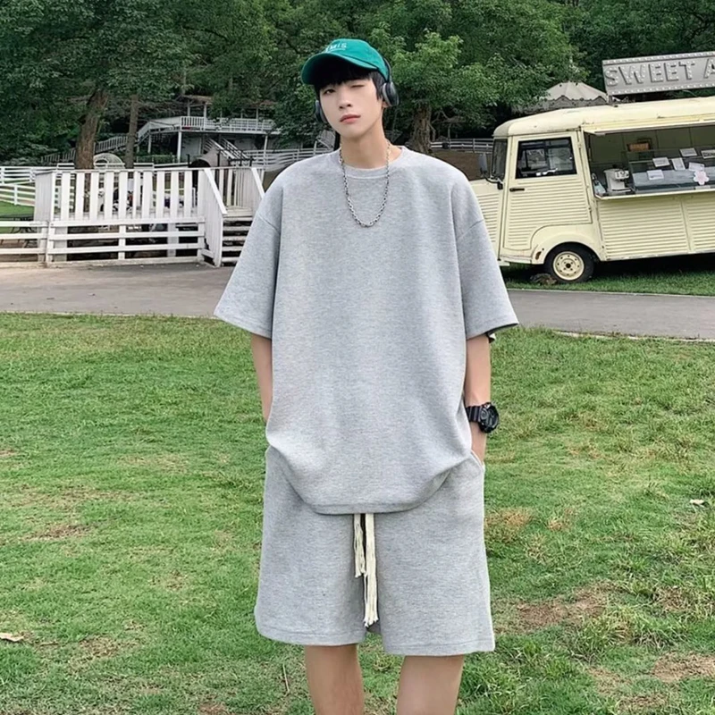 

Summer New Korea Solid Loose Tracksuits For Men's Set Sleeves T-Shirt + Shorts Sportswear Brand Sporting Suit Oversize 5XL