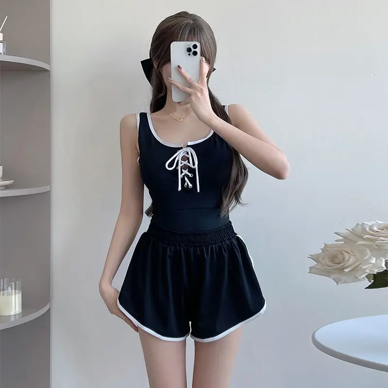 

New One-piece Suspender Two-piece Sports Swimsuit Slim Body Backless Belly Cover Hollow Strap Girl Design