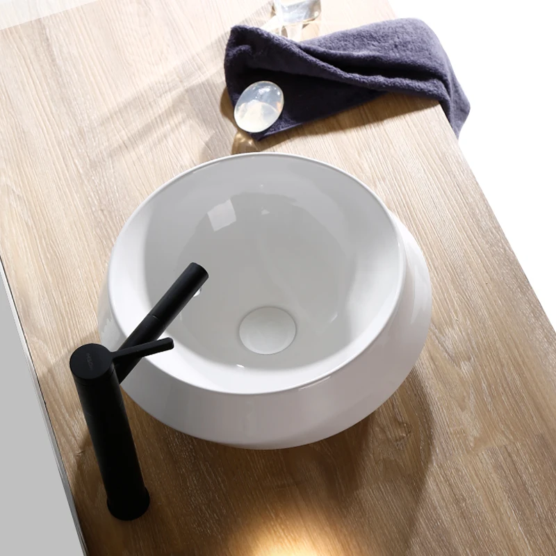 White Basin Ceramic Washbasin Modern Fashion Simple round Ceramic Washbasin Household ceramic wash basin bathroom sink