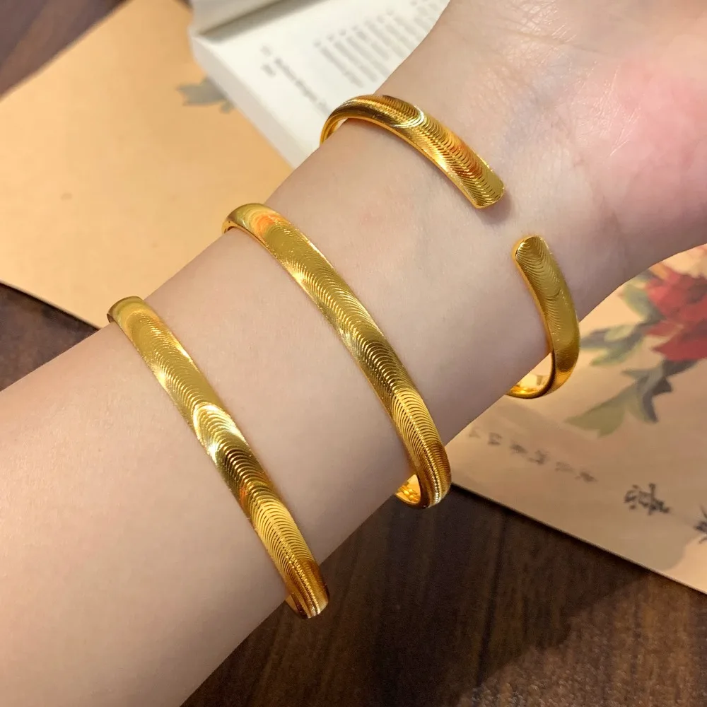 Burst flash cat eye bracelet women simple in ancient style open bracelet 9999gold
