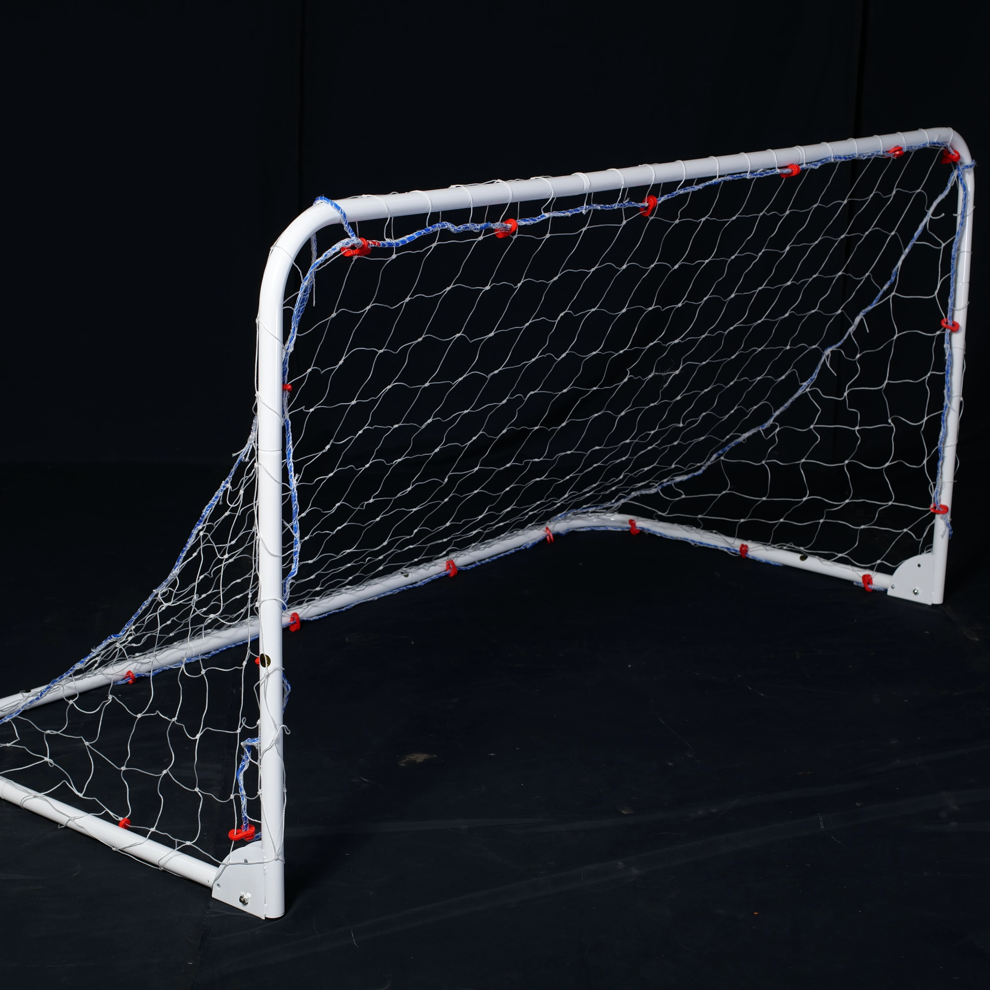 Porta de fútbol portátil con red de fútbol infantil.