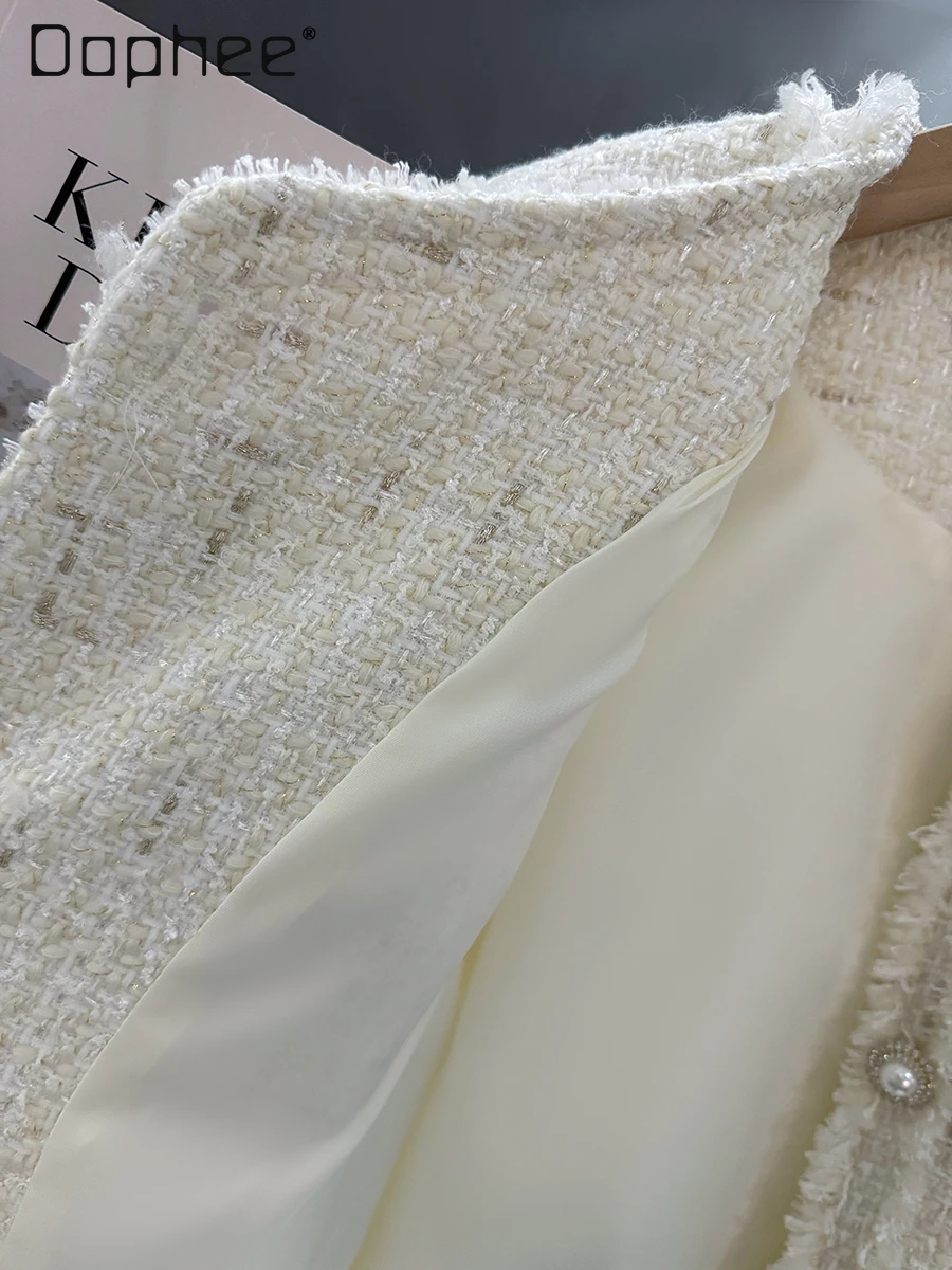 Cappotto corto in tweed da socialite di lusso leggero bianco sporco per donna Cappotto invernale allentato monopetto con nappa moda elegante girocollo