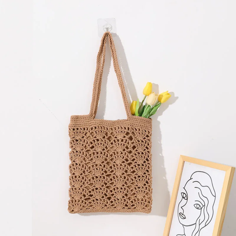 

Korean Version New Niche Crocheted One-Shoulder Woven Bag Female Hollow Literary Hand-Held Straw Bag Seaside Holiday Beach Bag