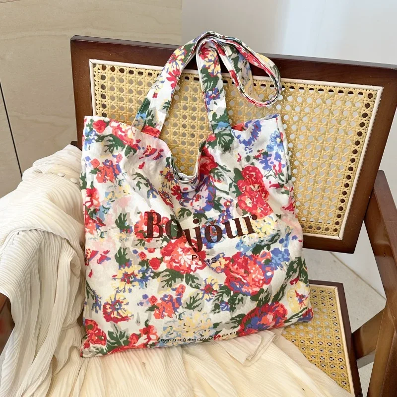 

Canvas Buckle 2024 Hot Selling Tote Bag Flower Large Capacity Casual Women's Handbag Soft Versatile Commuter Shoulder Bag