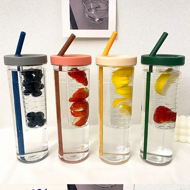 Transparent water bottle with straw and fruit infuser
