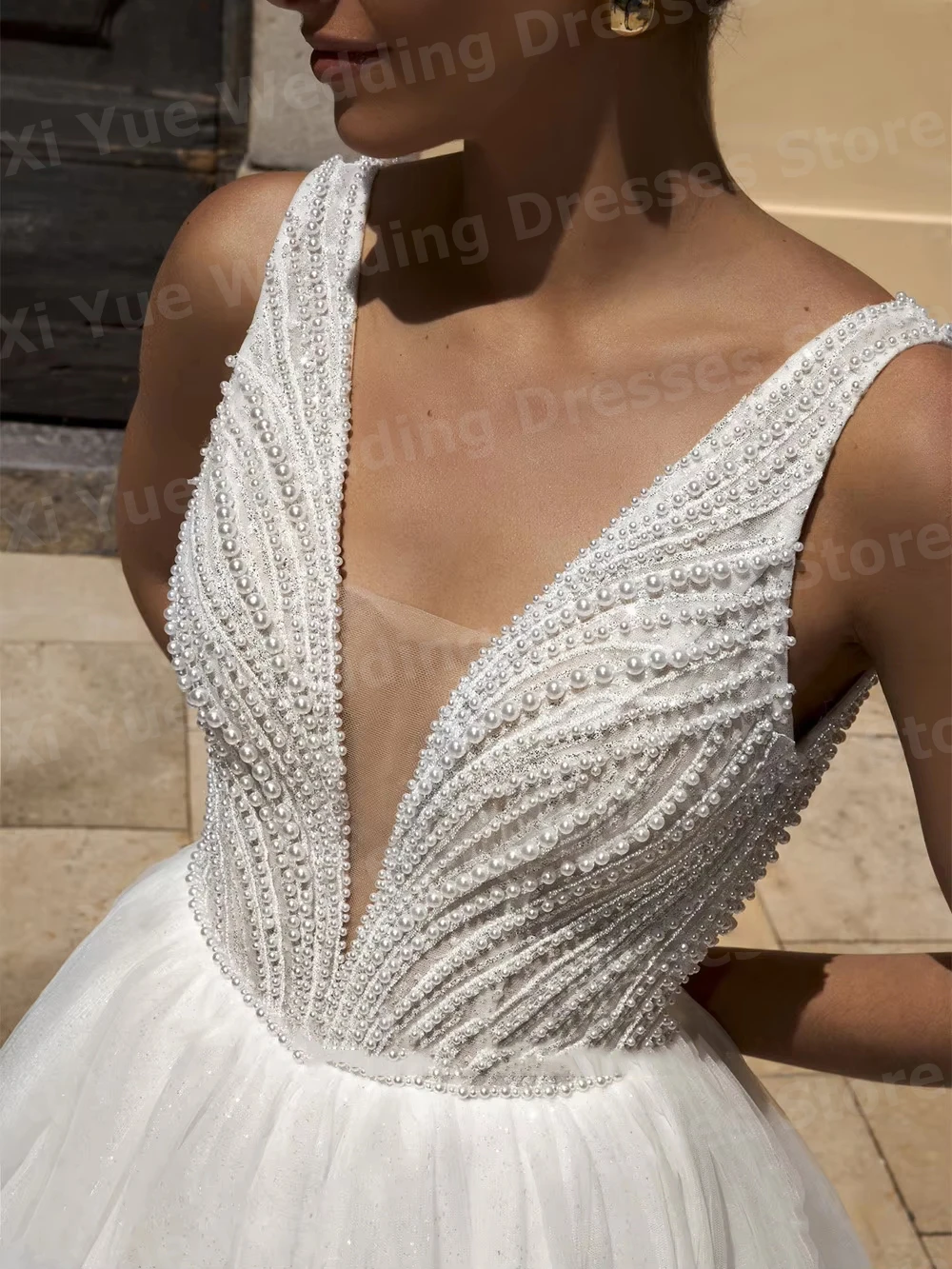 2026 魅力的なAライン女性用Vネックノースリーブウェディングドレス、パール付きブライダルガウン、カスタムメイドのローブ・ド・マリエ