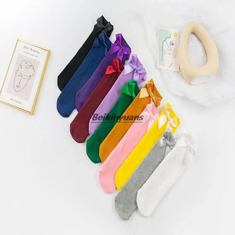 

New spring and summer double-needle bow lace cotton tube girls baby socks loose children pile socks