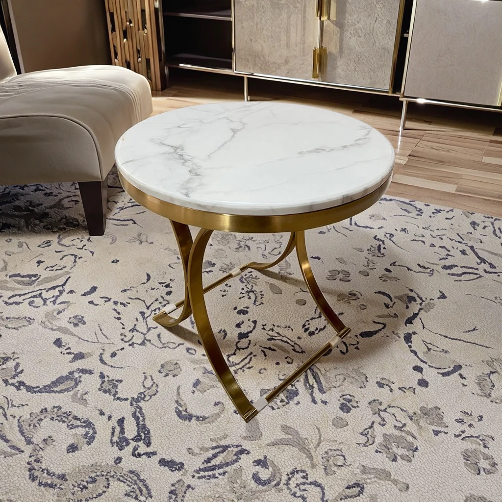 Modern round coffee table with marble top and metal frame